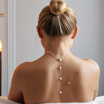 **A serene woman receiving acupuncture treatment in a modern Stockholm clinic. Focus on the gentle placement of needles in her back and shoulders, soft lighting, and a sense of relaxation. Include traditional Swedish design elements in the background.**